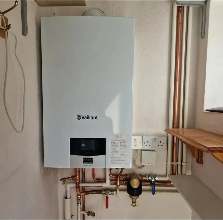 New Vaillant combi boiler installed by FireFlow with system filter and tidy copper pipework