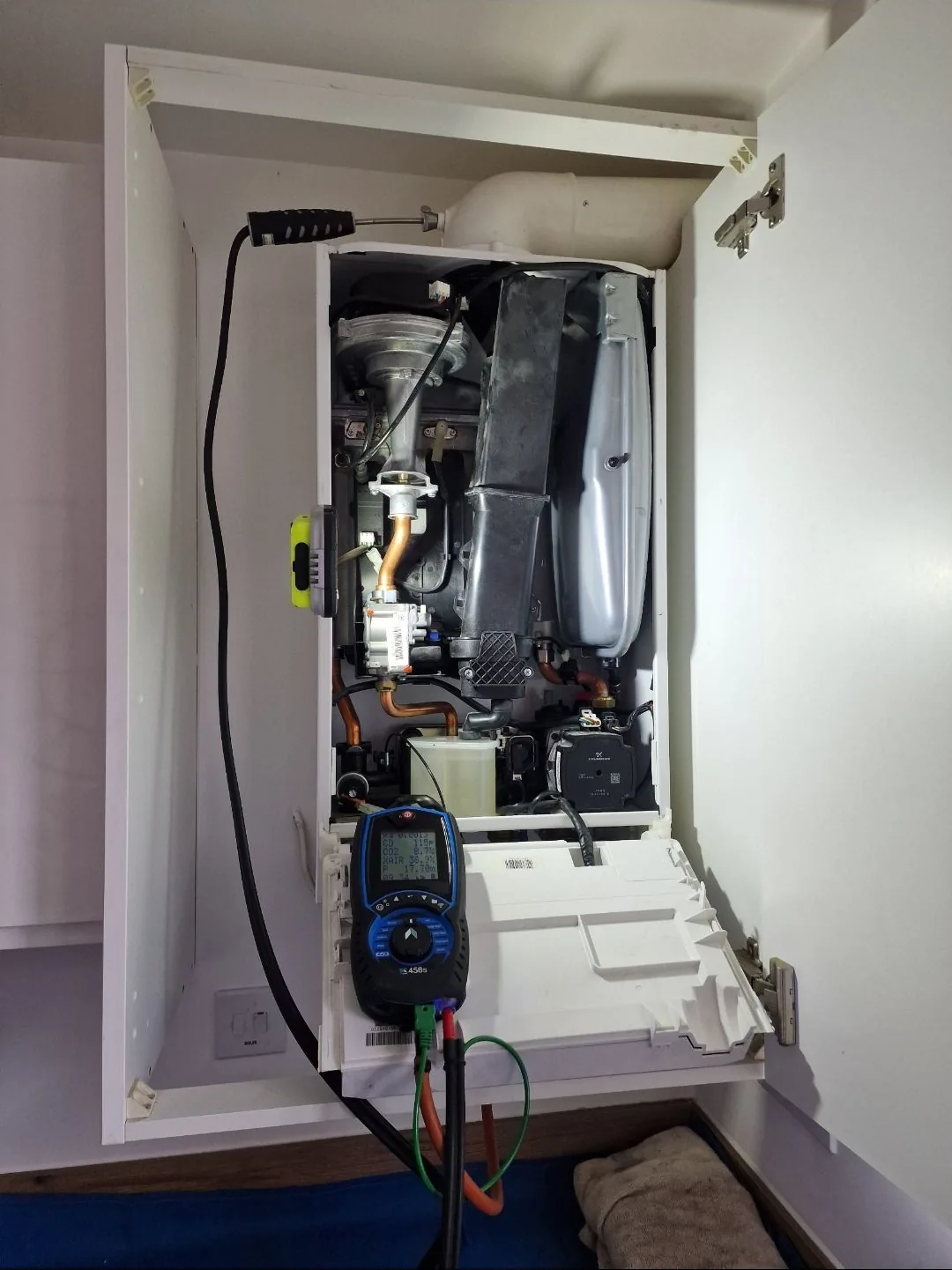 Vaillant boiler mid-service with flue gas analyser probe fitted